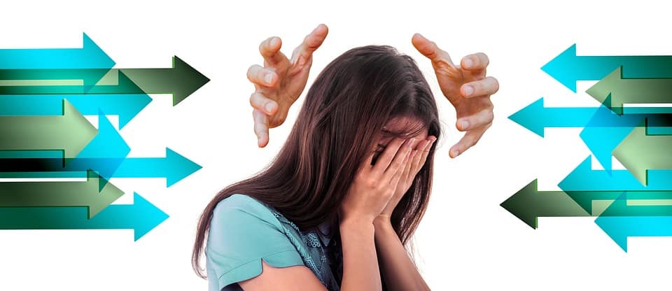 OCD Woman covering her face between arrows pointing in opposite directions
